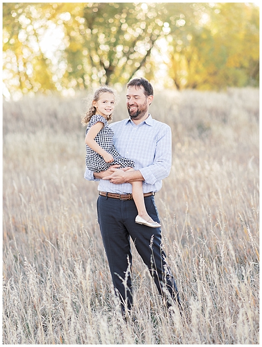 Denver Fall Family Session on Film dad holding his daughter 